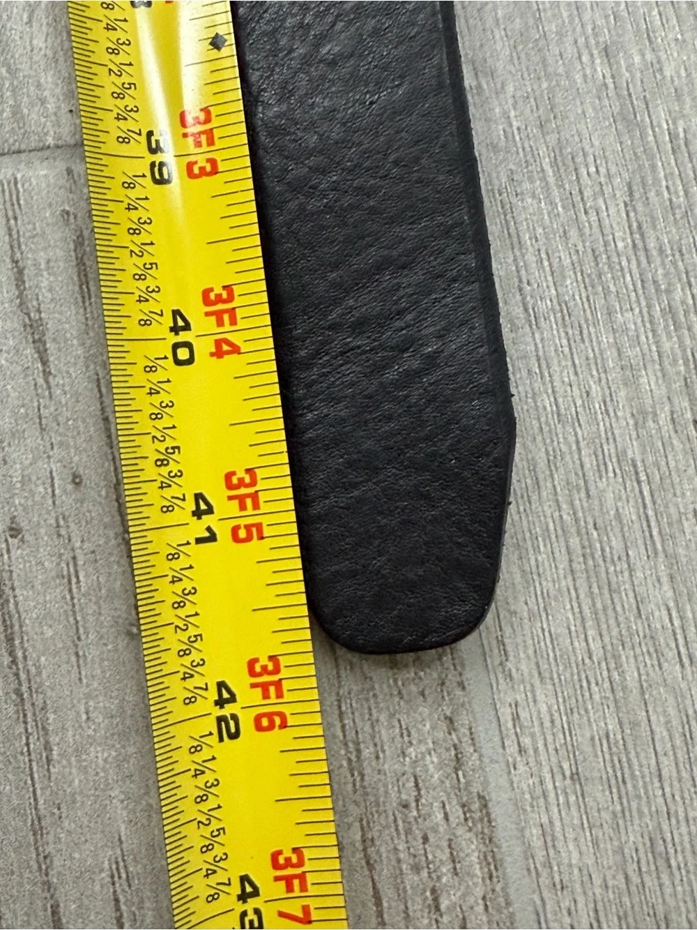 Fossil black genuine leather belt oval Fossil logo plate silver tone buckle 36
